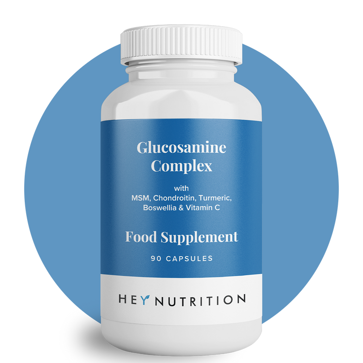 A close-up of Hey Nutrition’s Glucosamine Complex supplement bottle with a blue label, shown against a round blue background.