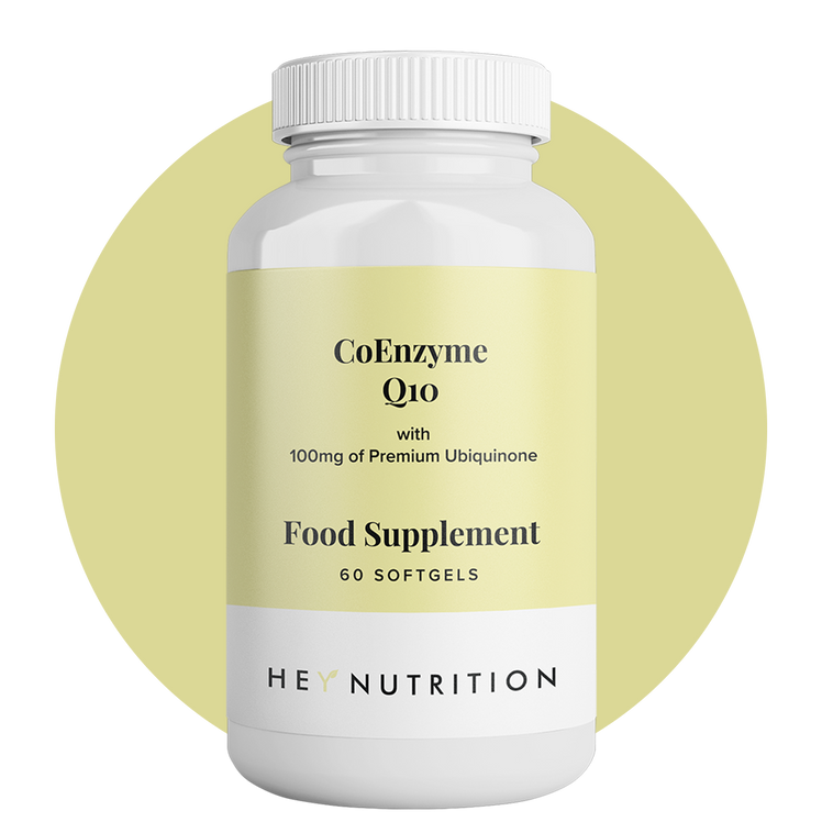 A bottle of Hey Nutrition CoEnzyme Q10 Food Supplement, featuring a light yellow label that highlights 100mg of premium ubiquinone per serving, shown against a yellow circular backdrop.